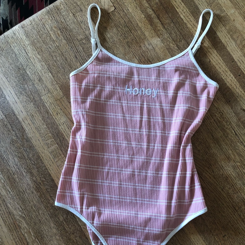 “Honey” pink striped onesie